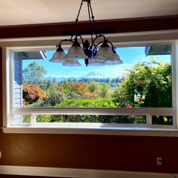 A new window overlooking a beautiful landscape and mountains.